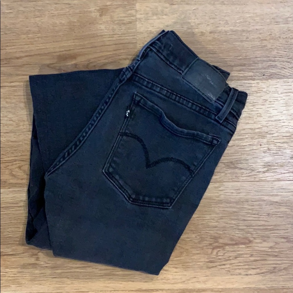 Dark grey Levi’s 710 super skinny jeans.